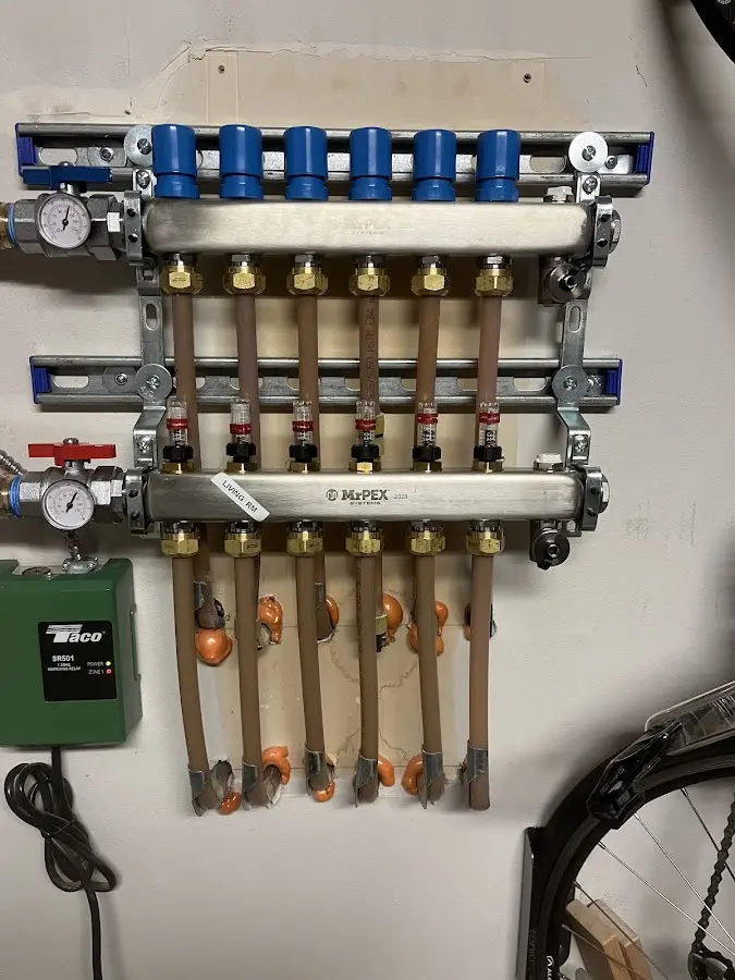 Plumber performing Gas Line Installation at a residential property in Portage